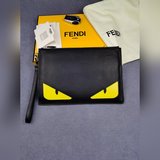 品牌：  fendi  芬迪款號：  風琴黃貼手包貨號：  168568顔