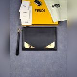 品牌：  fendi  芬迪款號：  風琴金鐵片手包貨號：  168568