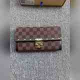 M60535 Venice 錢夾 以 Damier Ebene 帆布制成，并飾以