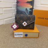 原版皮路易威登經典emilie錢夾，時尚而實用，粉色皮革飾邊與可愛的monogr