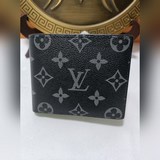 M60895  黑花   由全新标志性 Monogram Eclipse 帆布裁