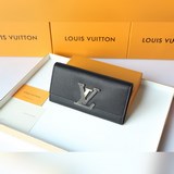 m61248 采用柔軟的taurillon皮革打造，綴以皮革覆面 lv标志，這款