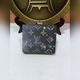 M60895 錢包星空 路易威登将目光投向了璀璨無垠的浩瀚太空，在2023春夏季