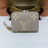 M69787   取材 Monogram Empreinte 牛皮，烘托 Mon