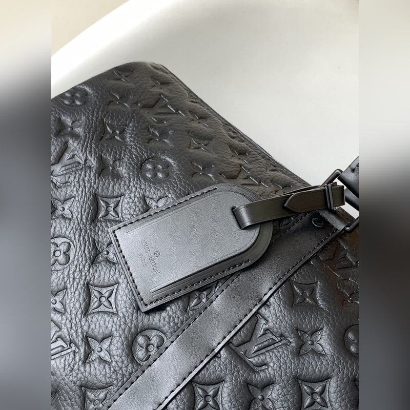 頂級原單M59025黑色壓花 本款 Kee all 旅行袋為細(xì)膩牛皮革壓印 Mo