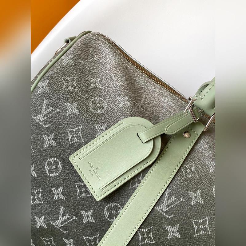 m11718 變碼芯片 用漸變單圖畫布制作，這款keepall帶子包45以其印刷