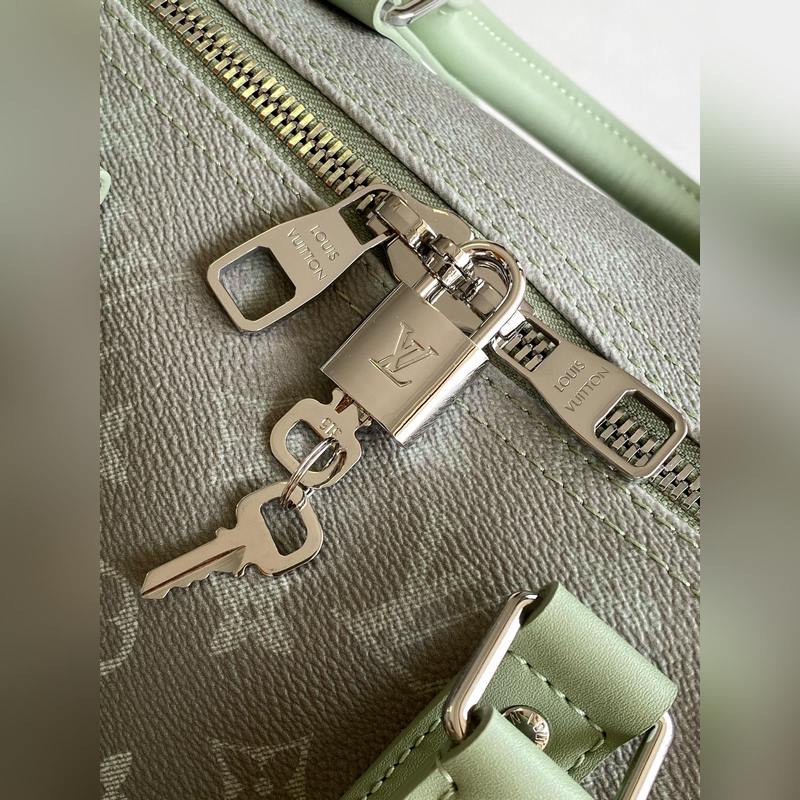 m11718 變碼芯片 用漸變單圖畫布制作，這款keepall帶子包45以其印刷