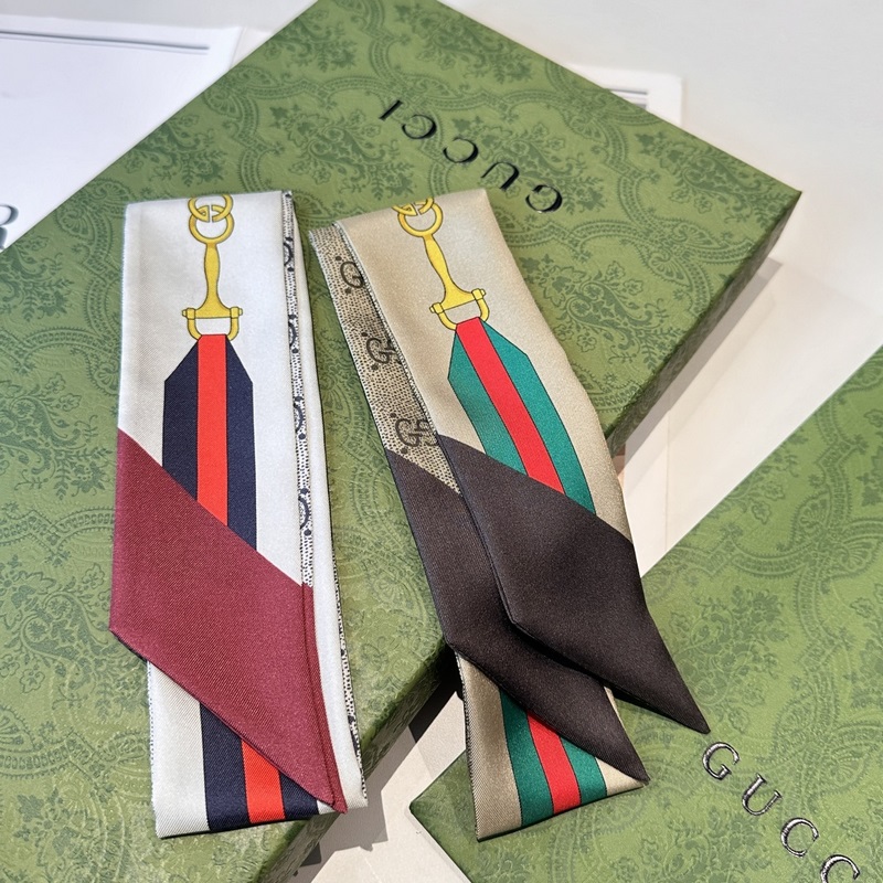 Gucci古馳twilly絲巾，皮帶金鎖 GG字母款式經(jīng)典，造型修長，兩端尖角設