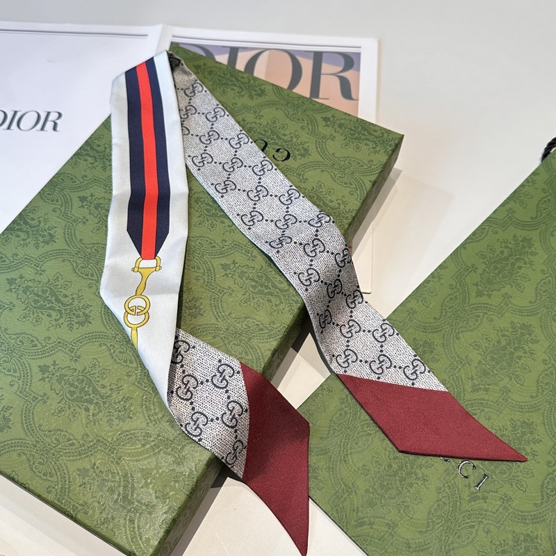 Gucci古馳twilly絲巾，皮帶金鎖 GG字母款式經(jīng)典，造型修長，兩端尖角設