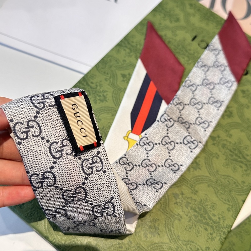 Gucci古馳twilly絲巾，皮帶金鎖 GG字母款式經(jīng)典，造型修長，兩端尖角設