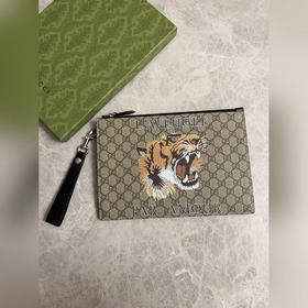 HUHUgucci 手包~采用進口Pvc搭配原版牛皮 配以的新款撕印~虎頭 簡單