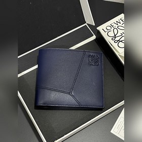男士對折錢包 錢包的靈感來自于puzzle 系列手袋， 采用獨特的幾何圖案 采用
