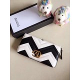 2023GG Marmont 長款拉鏈皮夾，采用絎縫打造，背面刺繡GG 標誌GG